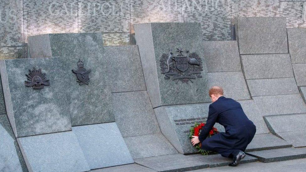 Prince Harry lays a wreath during a Dawn Service at the Australian memorial, Wellington Arch, London