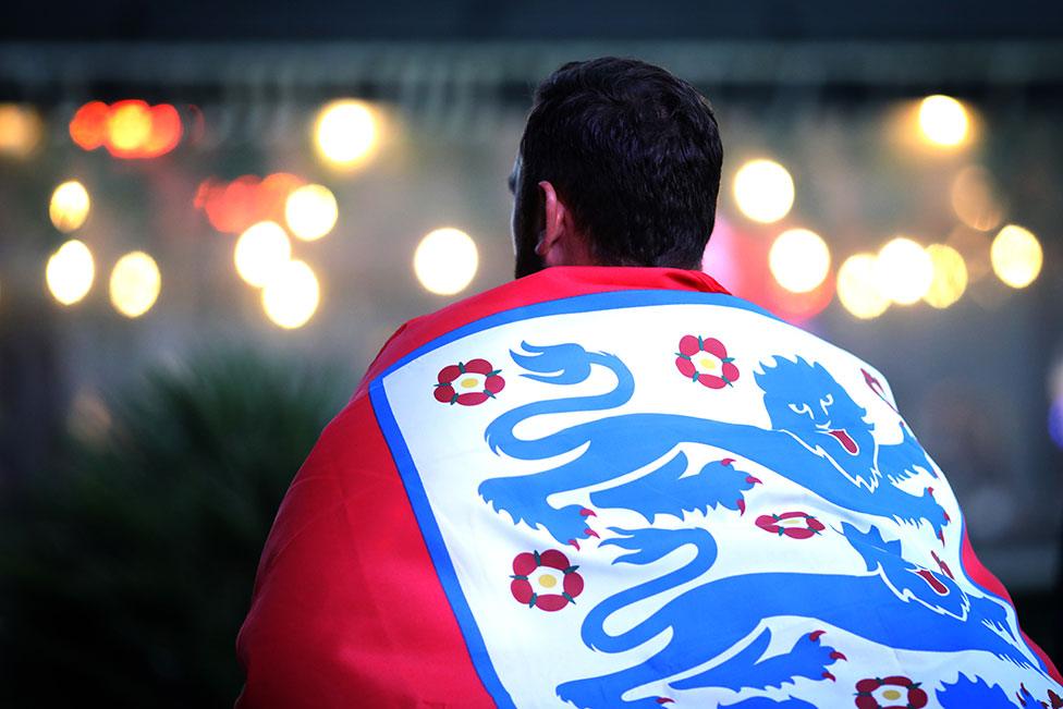 Fans leave after watching the semi-final match between England and Denmark at BOXPARK Croydon