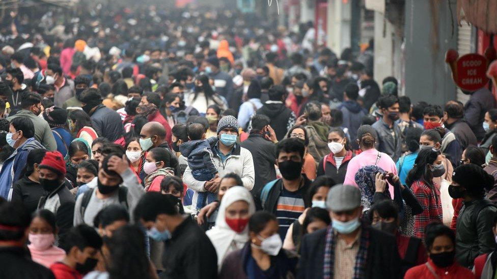 Heavy crowd throng Sarojni Nagar market after barricades were installed at the entrance by Delhi Police amid rising concern over Omicron variant of Covid on December 26, 2021 in New Delhi, India.