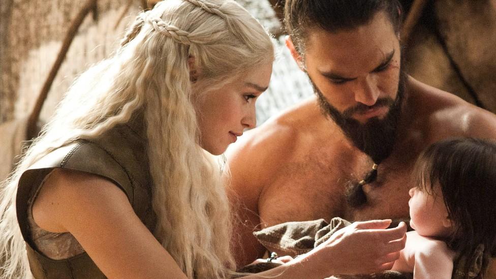 Clarke as Daenerys Targaryen in Game of Thrones, opposite Jason Momoa as Drago