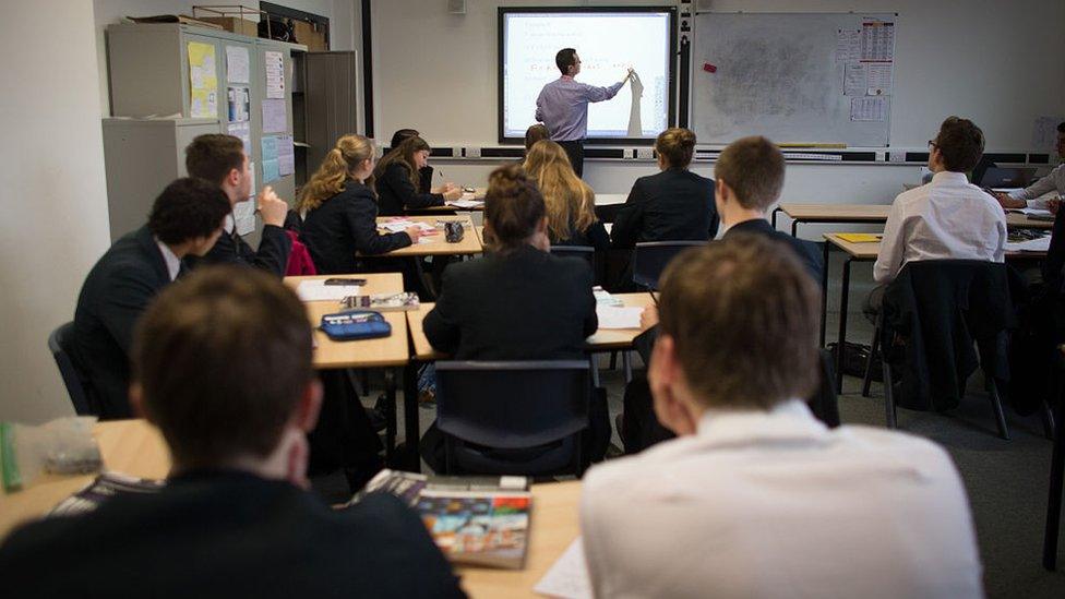 Students being taught in a classroom