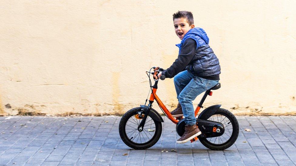 A child riding a bike