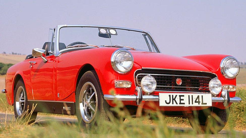 A 1973 MG Midget 1275 in country lane.