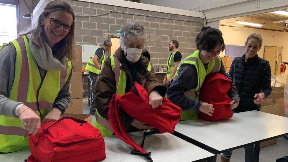 Some of the volunteers at the warehouse in Dorchester