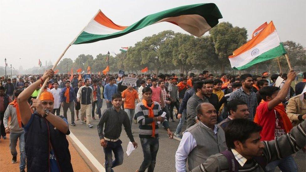 Indian student activists of the student organization Akhil Bharatiya Vidyarthi Parishad (ABVP) participate in a protest march at Rajpath against a group of Jawaharlal Nehru University (JNU) students for shouting anti-national slogans in New Delhi, India, 12 February 2016.