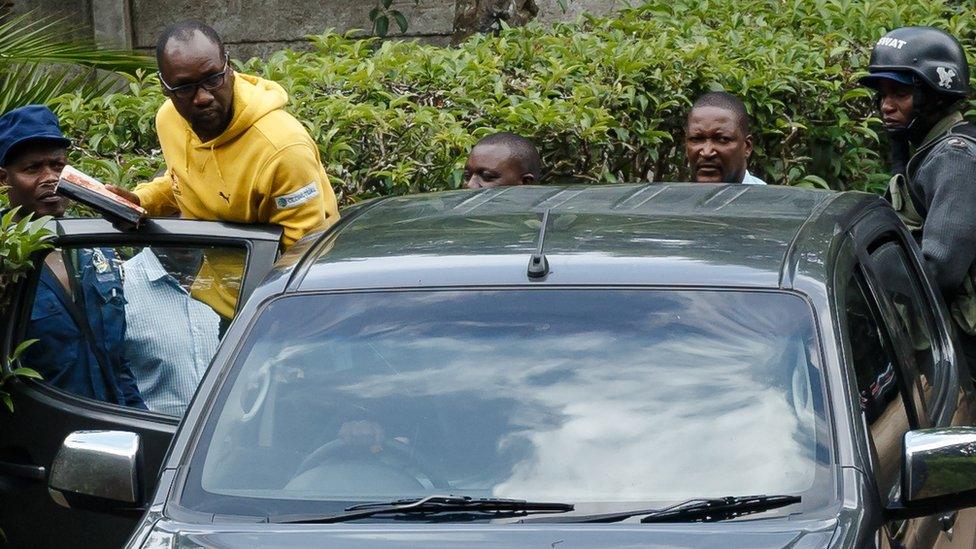 Pastor Mawarire is led into a police vehicle