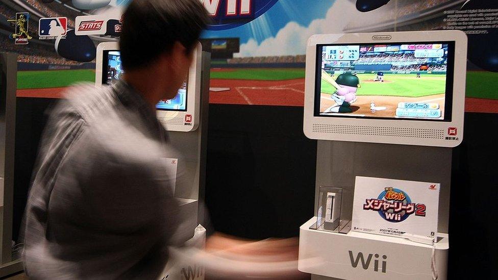 Player using Wii console