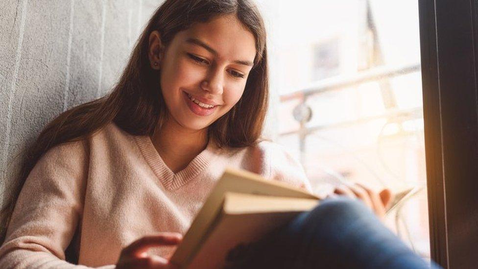 Child reading book