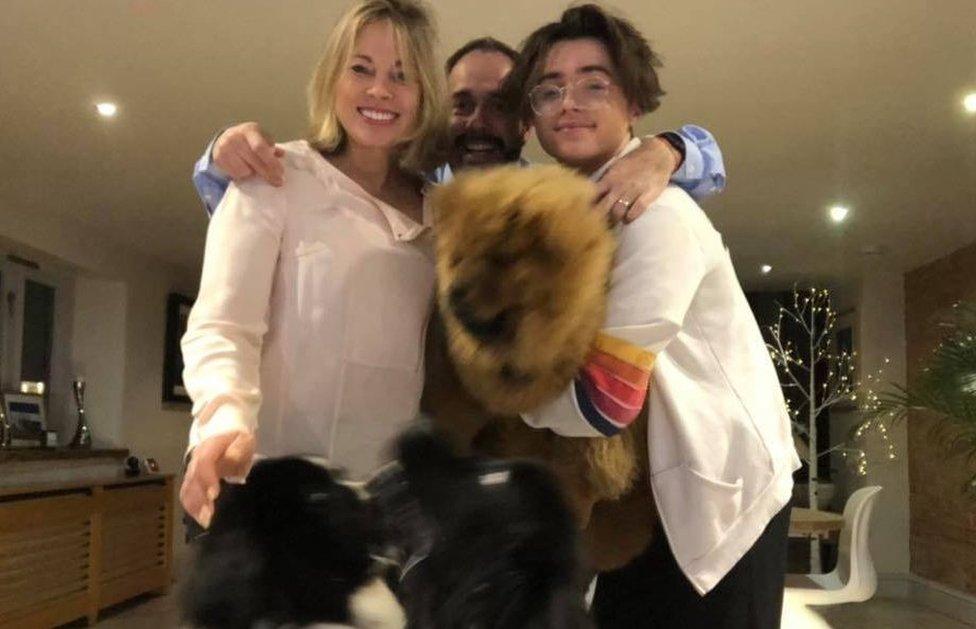 Bungle the dog with his family