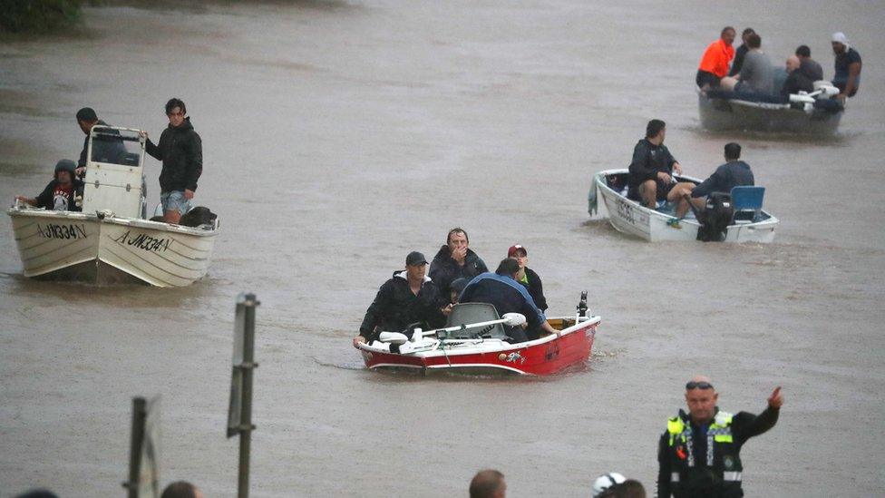 Residents evacuate as flooding occurs in the town of Lismore, northeastern New South Wales, Australia