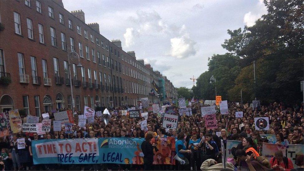 People marching through Dublin