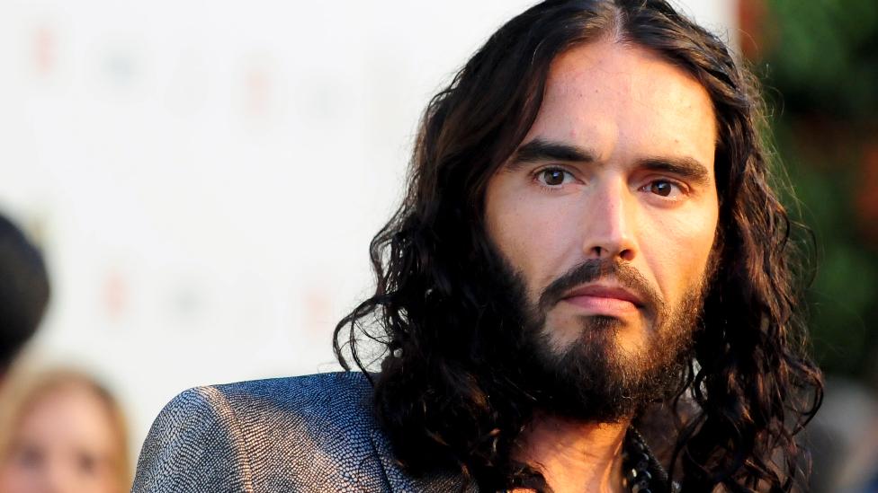 British actor Russell Brand arrives at the Hollywood FX Summer Comedies Party in Los Angeles, California June 26, 2012