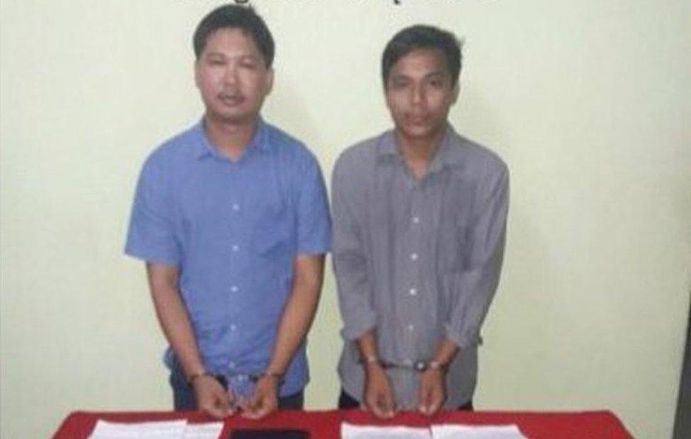 Reuters journalists, Wa Lone (L) and Kyaw Soe Oo, are seen in a photo, released on 13 December 2017 by Myanmar Ministry of Information, after they were arrested.