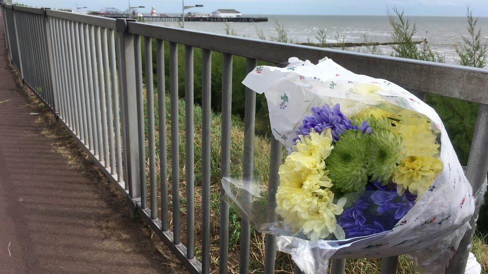 Flowers on a fence