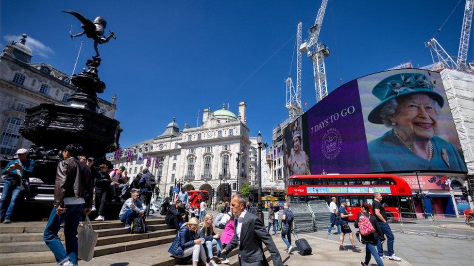 Pictures of the Queen are shown on the screen at Piccadilly Circus ahead of the Jubilee celebrations