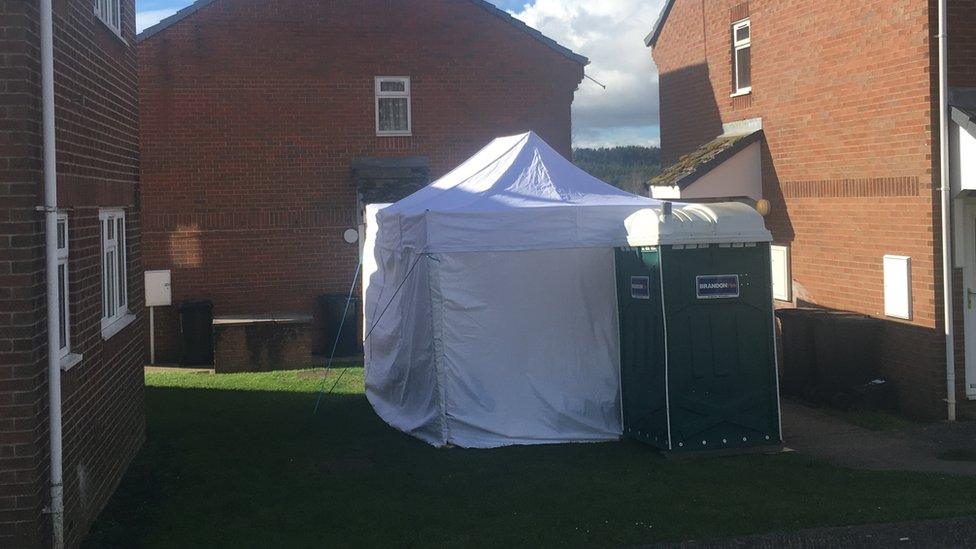 Tent outside house