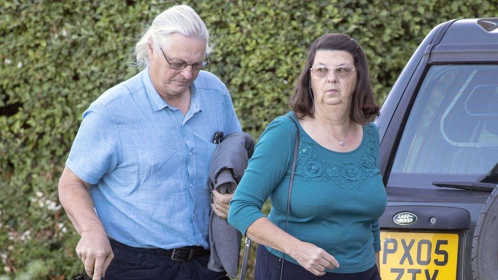 Duncan Tomlin's father, Paul Tomlin (left), arrives at the Office of the Police Crime Commissioner in Lewes, Sussex, for the misconduct hearing