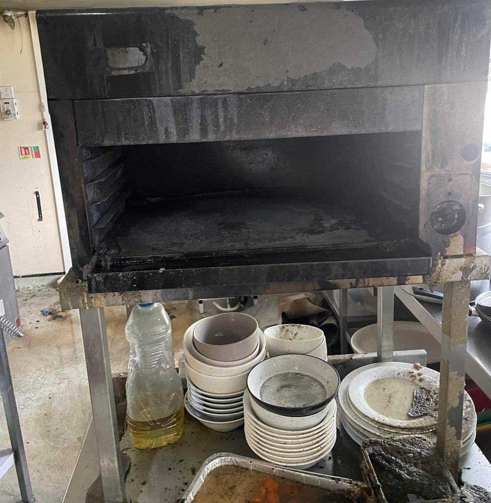 A fire damaged kitchen in an Essex care home