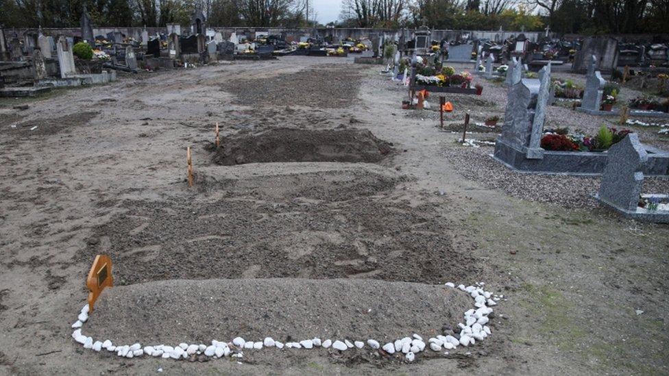 Graves of migrants who died while trying to cross illegally from France into Britain, at the Cimetiere Nord, in Calais, France, 25 November 2021