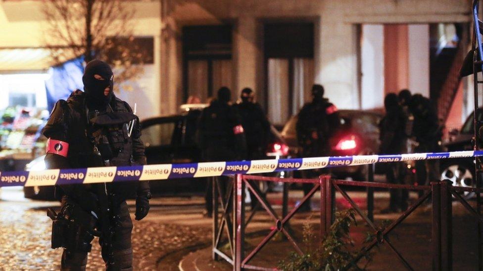 Belgian special police forces take part in an operation in Molenbeek in Brussels, Belgium, 22 November