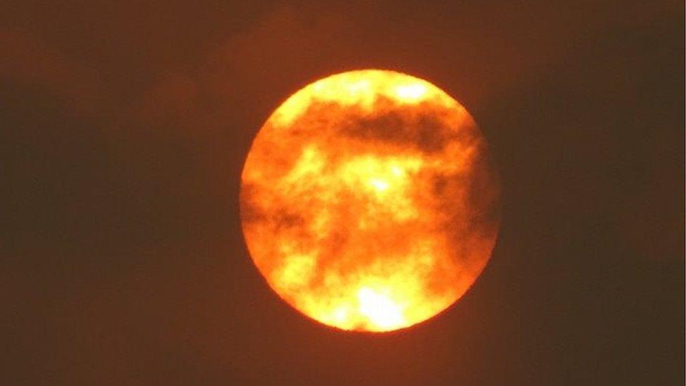 A picture of the red sun in Glanypwll