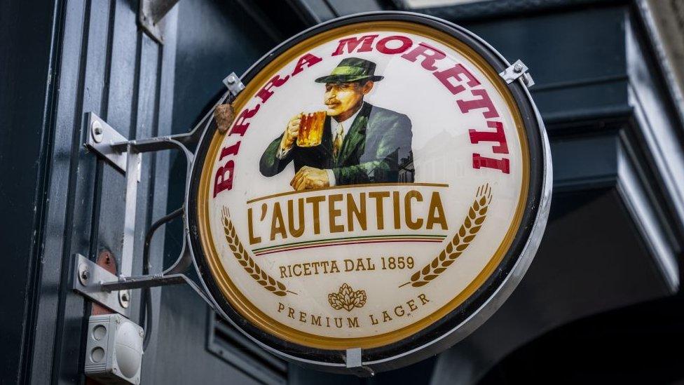 A sign for Birra Moretti