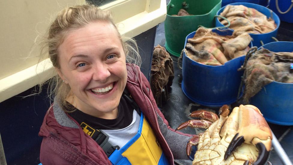 Polly Weston holding a crab