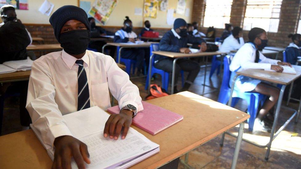 Students wearing face masks in class in South Africa