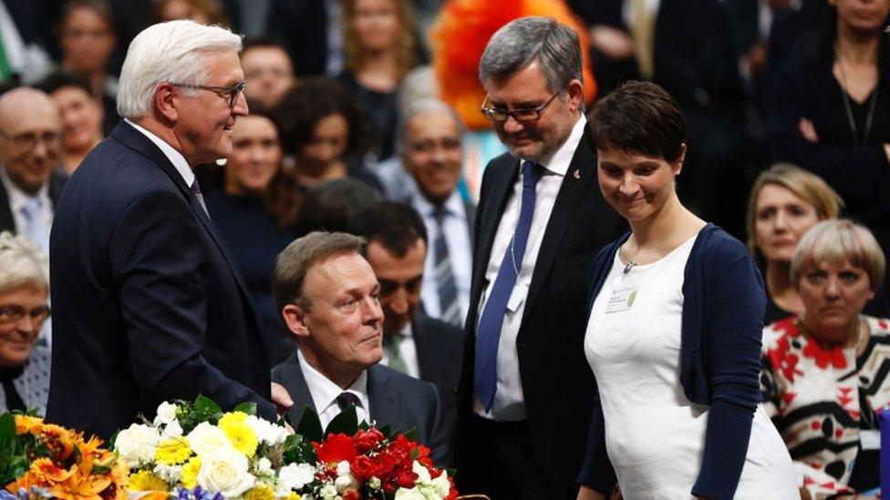 New elected German President Frank-Walter Steinmeier (left) is congratulated by the chairwoman of the Alternative fuer Deutschland party Frauke Petry (right)