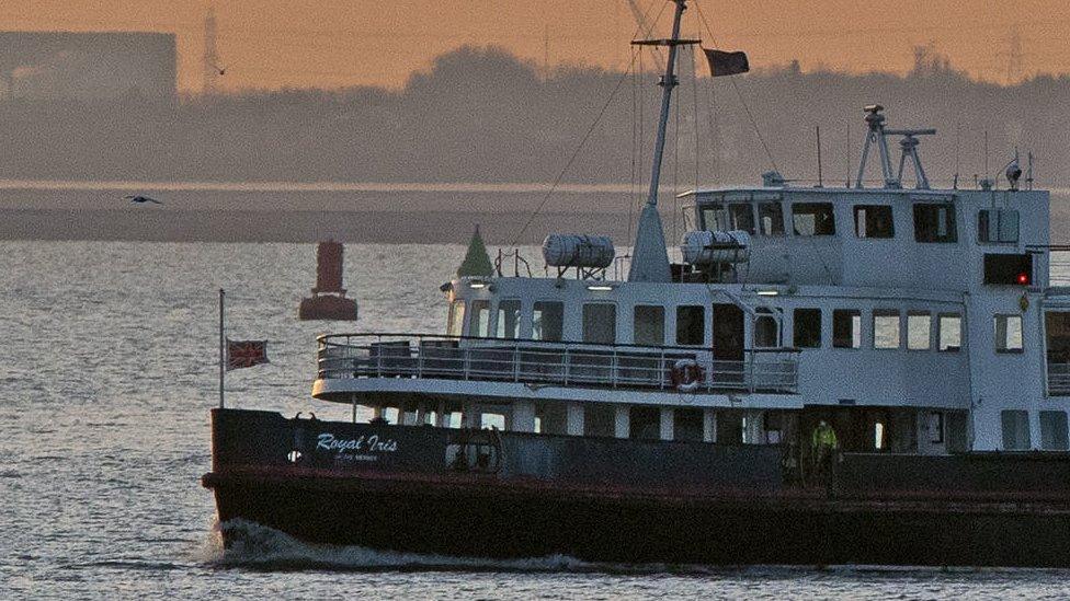 A flag on the Royal Iris Mersey ferry flies at half mast in memory of Gerry And The Pacemakers star Gerry Marsden