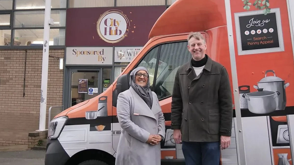 Ridwana Wallace-Laher of the Penny Appeal (l) and Ian Ormondroyd Bradford City Community Foundation