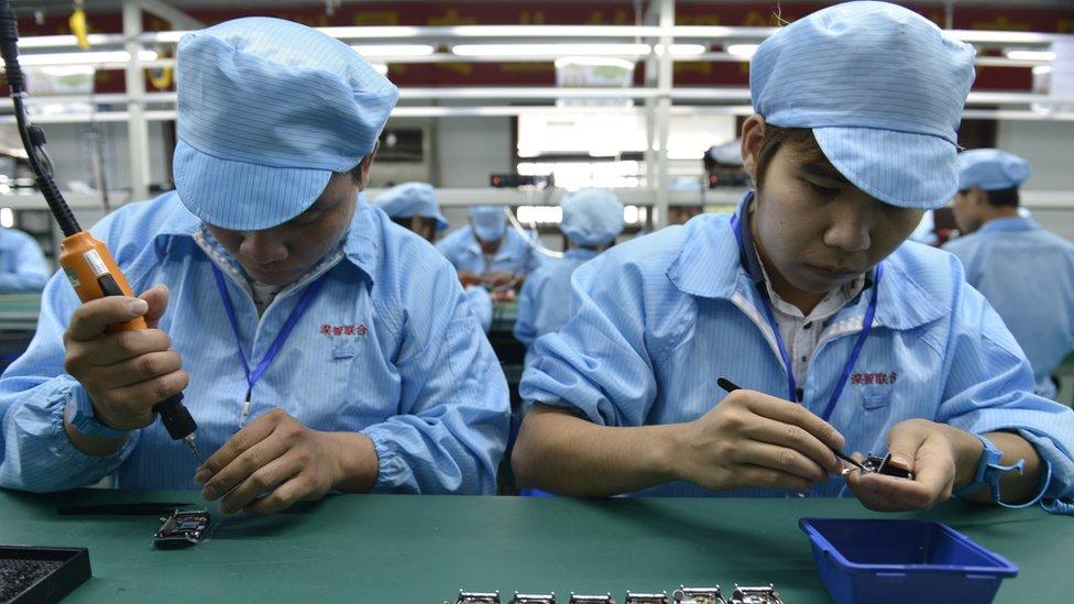 Chinese factory workers assemble a rival to Apple's Smartwhatch