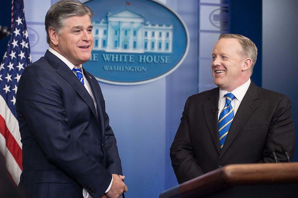 Hannity (left) taped a segment with ex-White House spokesman Sean Spicer shortly after Trump took office