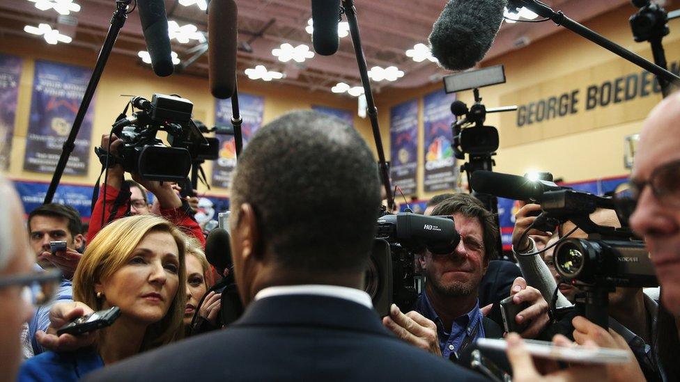 Ben Carson speaks to the press after the third Republican debate in Colorado.