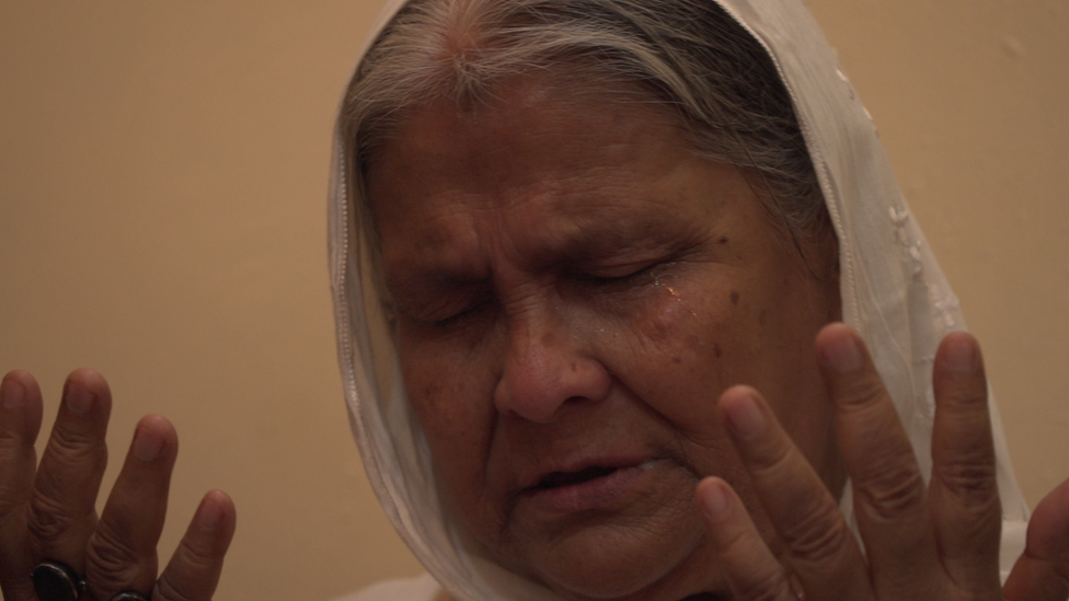 Shamimara cries as she talks about her son