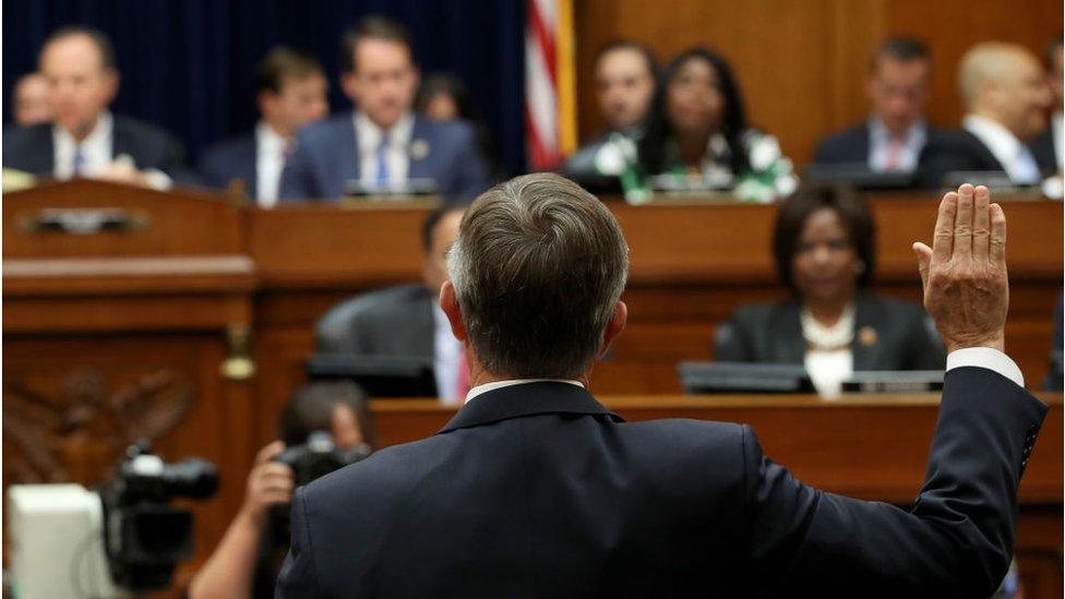 Acting Director of National Intelligence Joseph Maguire is sworn in prior to testifying