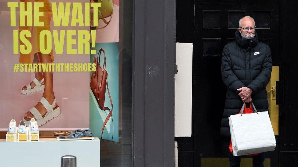 Shopper outside store