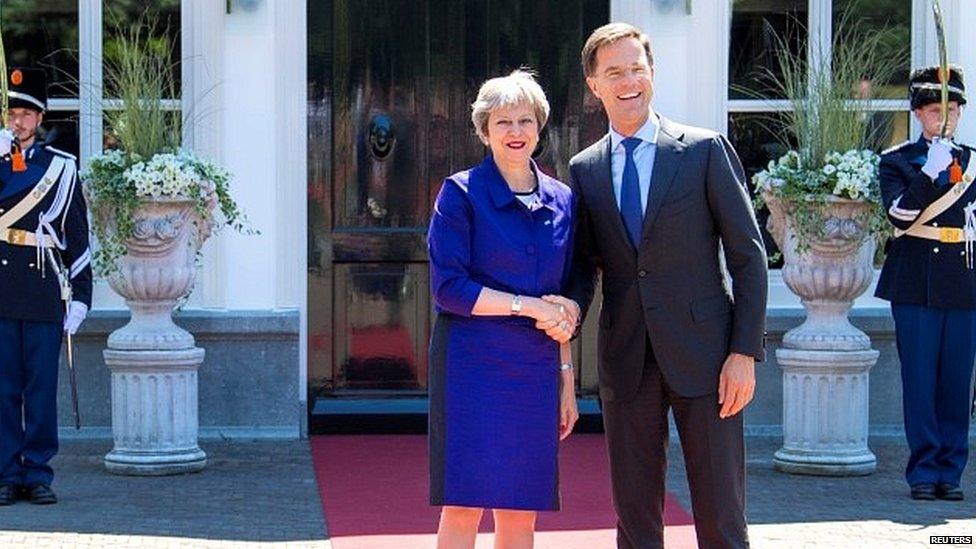 Theresa May meeting her Dutch counterpart in The Hague