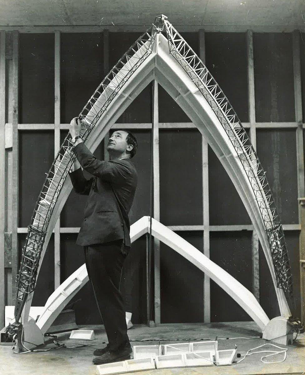 Bertony with model of arch