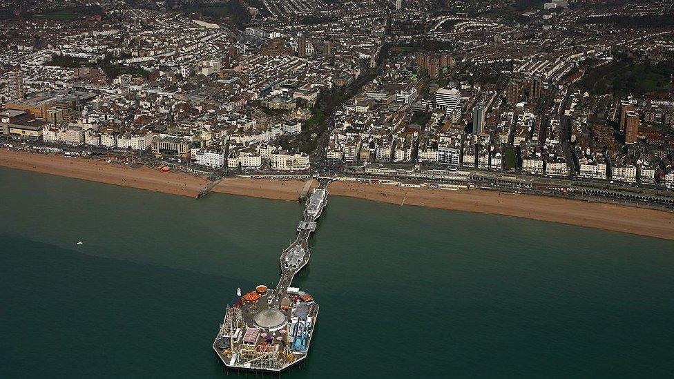 Aerial photograph of Brighton pier and coastline