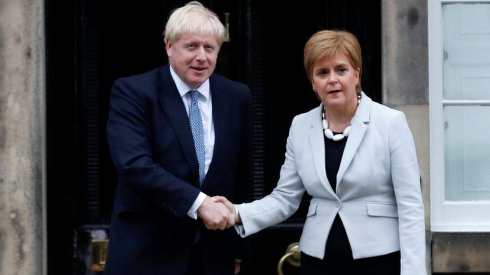 Nicola Sturgeon and Boris Johnson outside Bute House