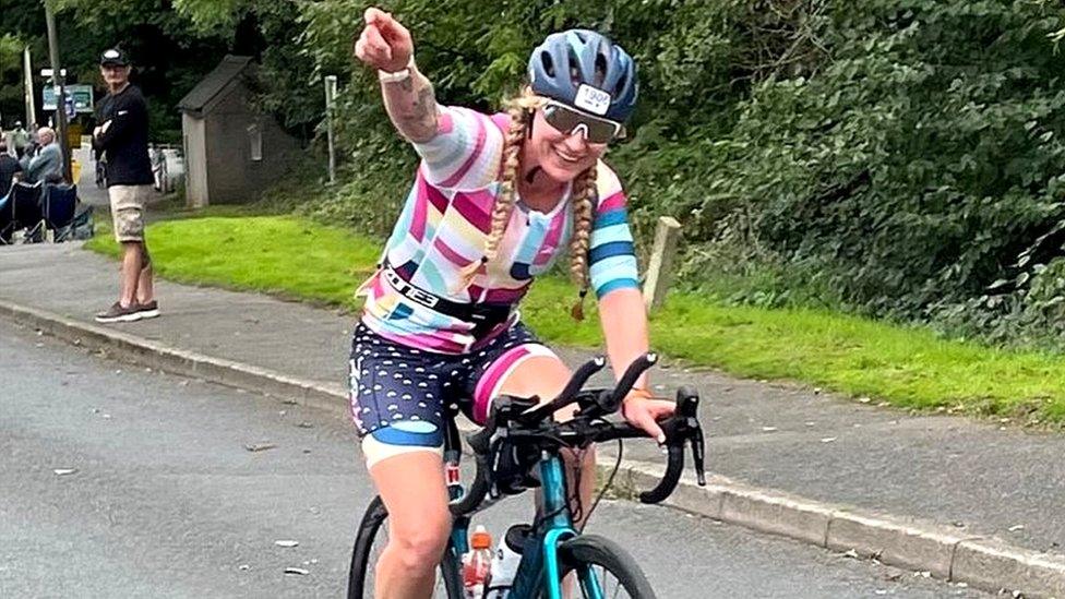 Lucy on her bike