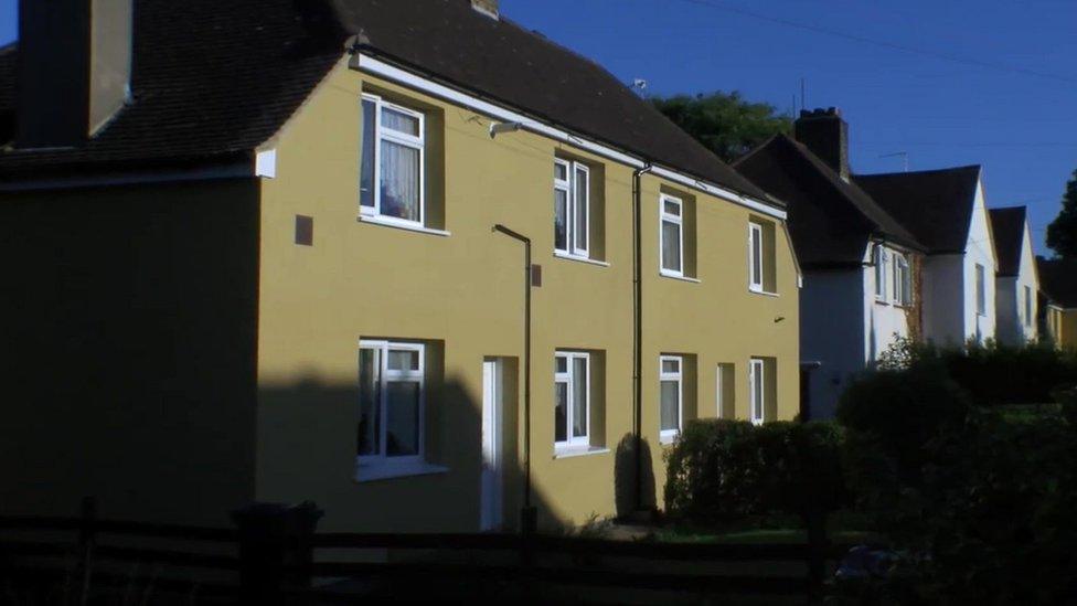 Mustard yellow coloured houses