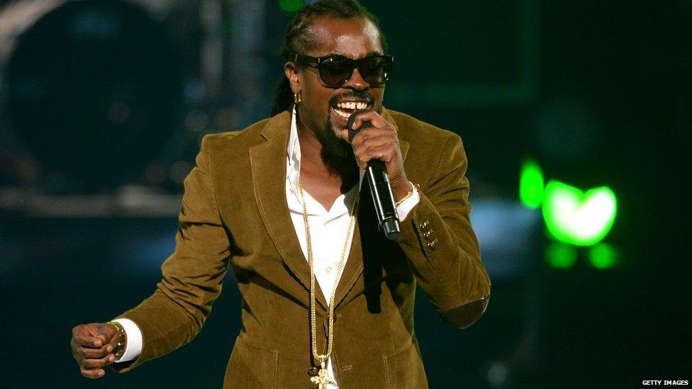 Beenie Man with microphone in hand