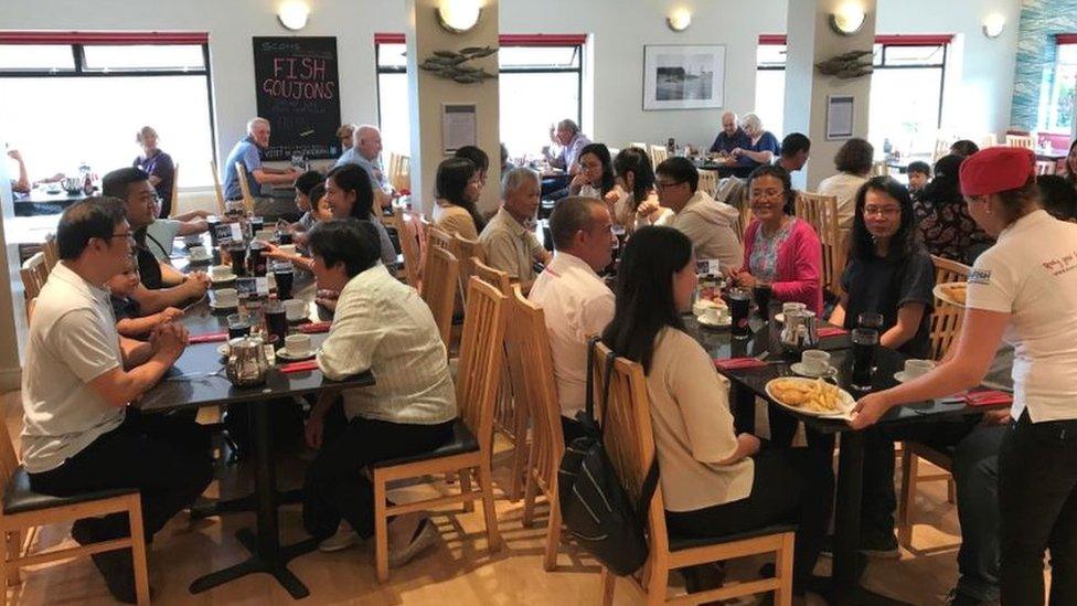 Chinese visitors to Scotts Fish and Chips