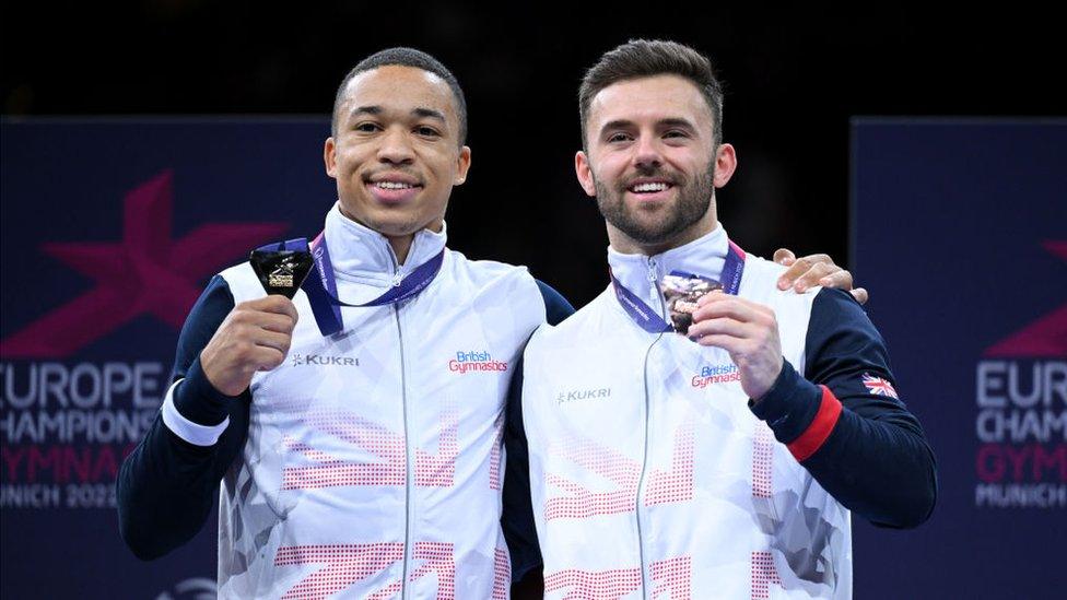 Joe Fraser and Giarnni Regini-Moran with their medals