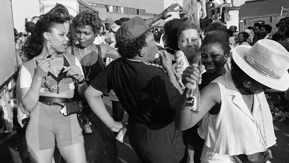 Revellers at Notting Hill Carnival, Elkstone Road, 1991