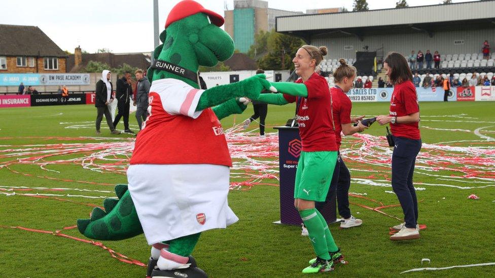 Gunnersaurus at a WSL match