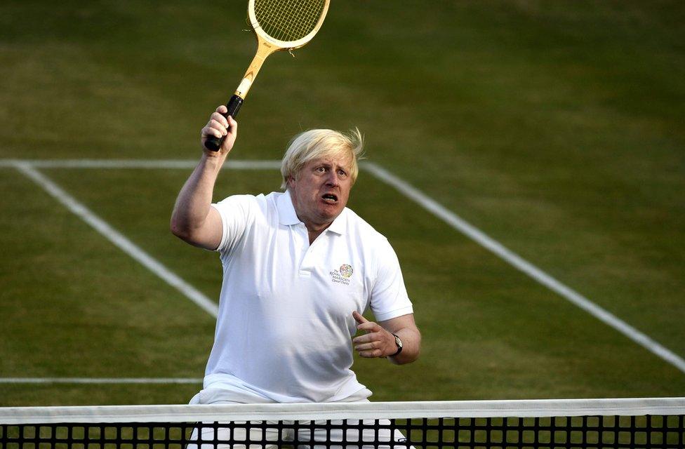 This file photo taken on June 16, 2013 shows Mayor of London Boris Johnson hits a shot during a celebrity tennis match in aid of The Royal Marsden Cancer Charity at the Queen's Club in west London on June 16, 2013