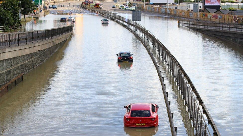 Cars stuck on a flooded North Circular